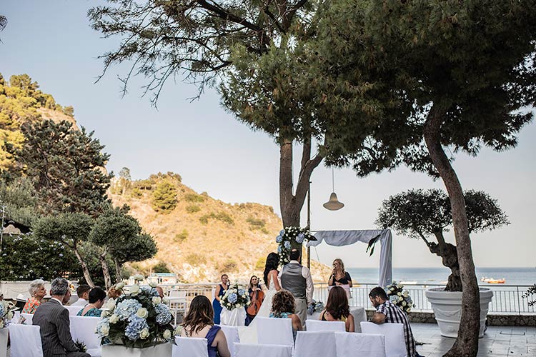 ceremony with a view over Isola Bella in Taormina