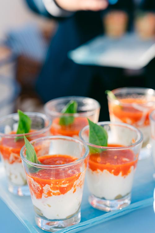 Tray of Sicilian arancini and savoury finger foods served during the romantic wedding dinner in Taormina, Sicily.