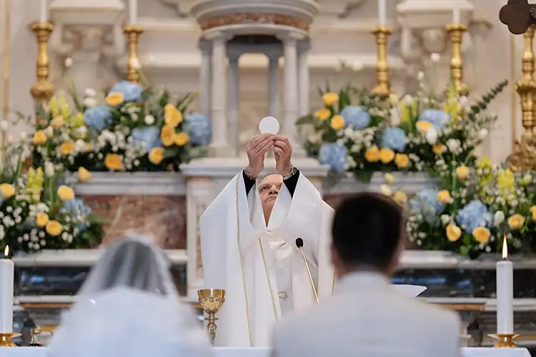 Wedding mass celebration inside a historic church in Taormina