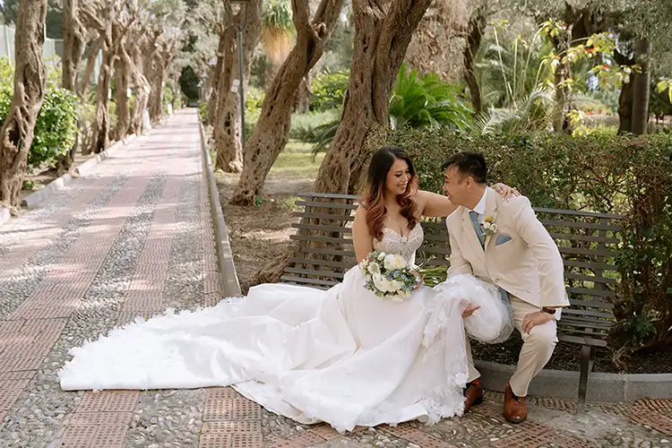 Relaxed couple portrait in a peaceful garden during their wedding day in Taormina
