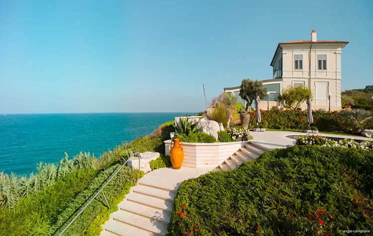Villa Estea overlooking the Adriatic Sea in Abruzzo, panoramic garden and cliffside setting