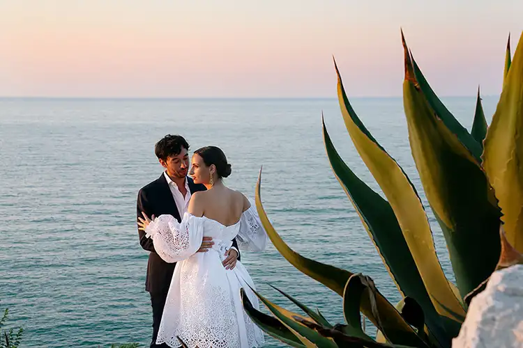 Romantic couple portrait at sunset overlooking the Adriatic Sea in Abruzzo