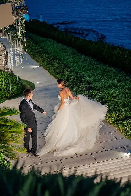 Bride and groom walking at sunset with Adriatic Sea view at Villa Estea in Abruzzo