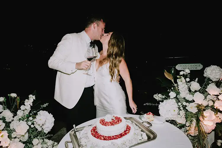 Wedding cake cutting during a romantic wedding in Portofino
