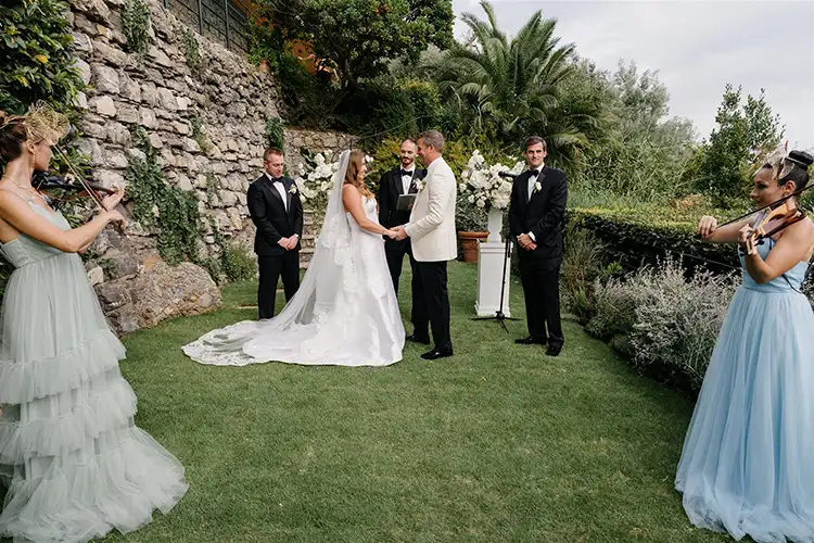 Bride and groom exchanging vows during a symbolic wedding ceremony in Portofino