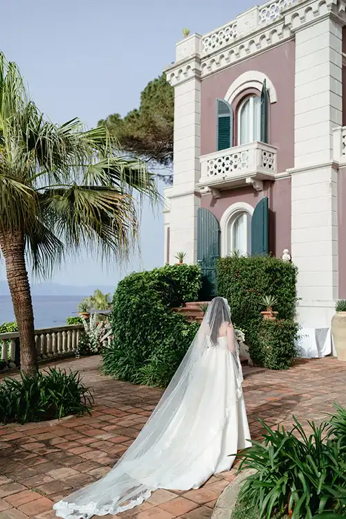 Bride walking through the gardens of Villa Paola in Tropea