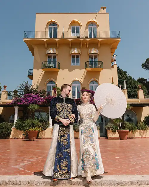 Bride and groom in fashion-inspired attire at a luxury wedding in Capri