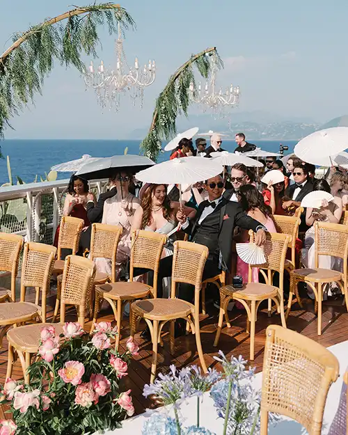 Guests attending an outdoor wedding ceremony in Capri