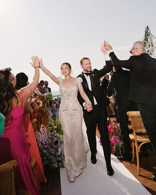 Bride and groom entering their wedding ceremony in Capri