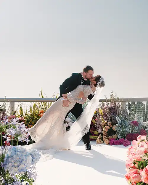 Bride and groom sharing a kiss after their wedding ceremony in Capri