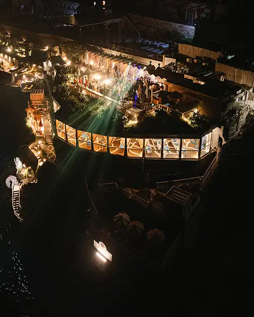 Aerial night view of Il Riccio wedding venue in Capri
