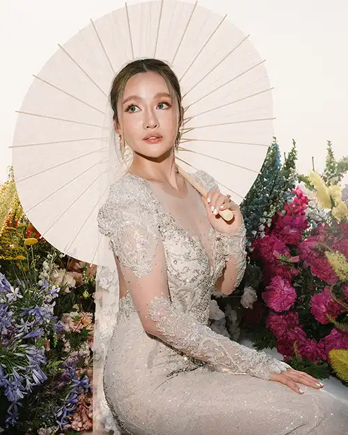 Bride portrait with parasol during a luxury wedding in Capri