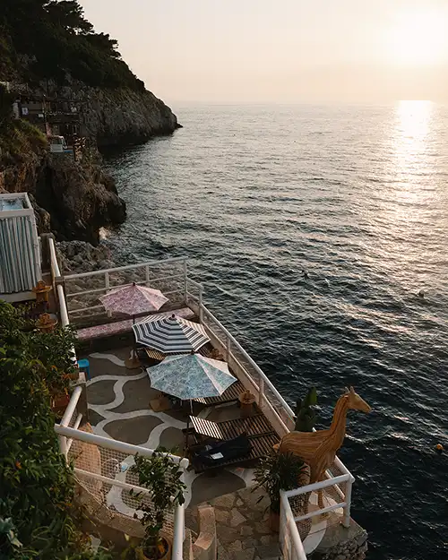 Seaside terrace at Il Riccio overlooking the cliffs of Capri