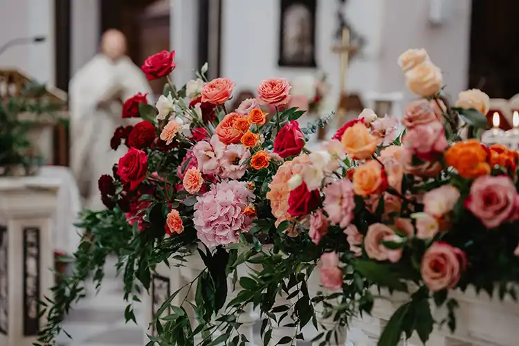 Elegant floral arrangements decorating the church for a wedding on the Italian Riviera