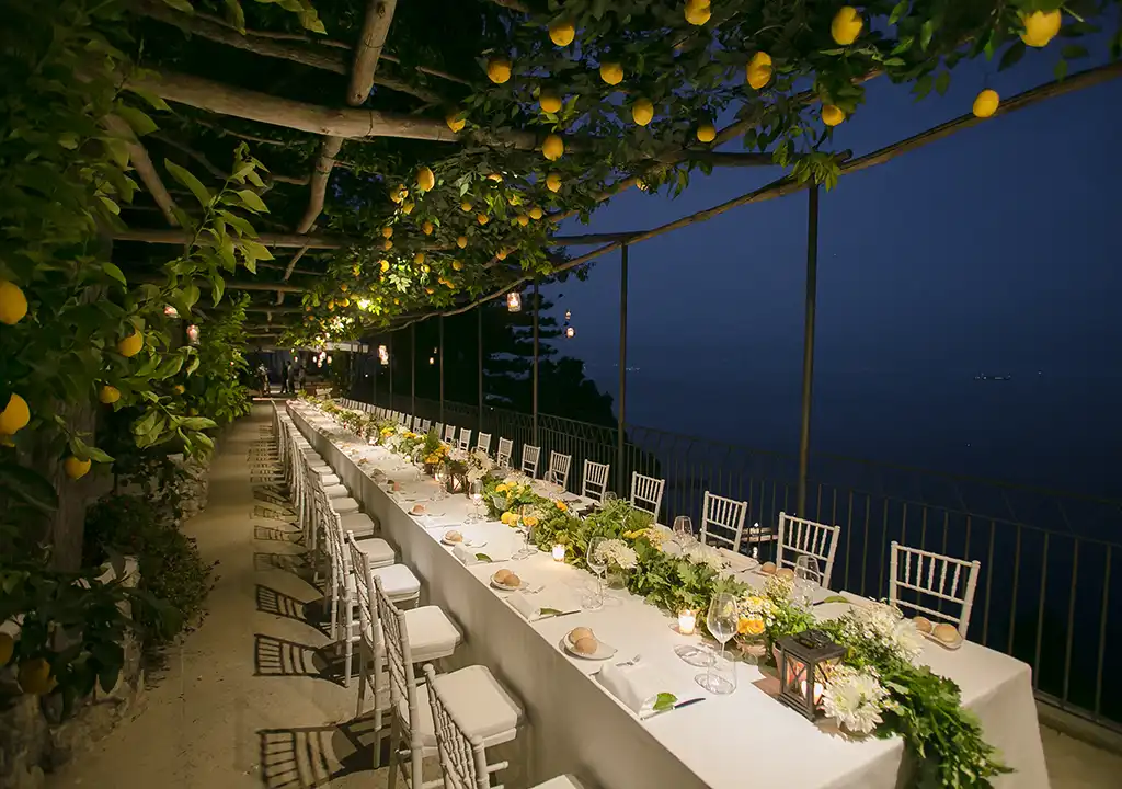 isw_Amalfi-Coast-wedding_lemons Wedding dinner under a lemon pergola overlooking the sea on the Amalfi Coast